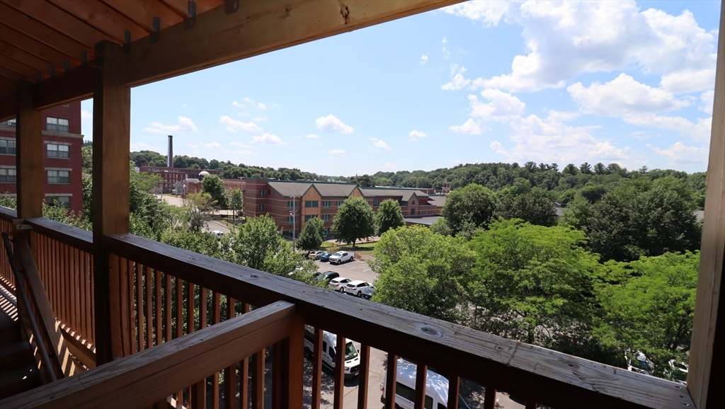 178 High Street, Unit 304 Clinton, MA 01510 - Photo 22 of 26 a view of a city from a balcony
