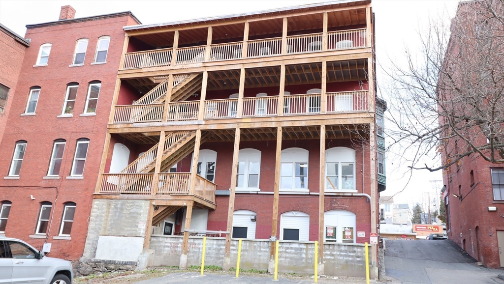 178 High Street, Unit 304 Clinton, MA 01510 - Photo 26 of 26 a front view of a building