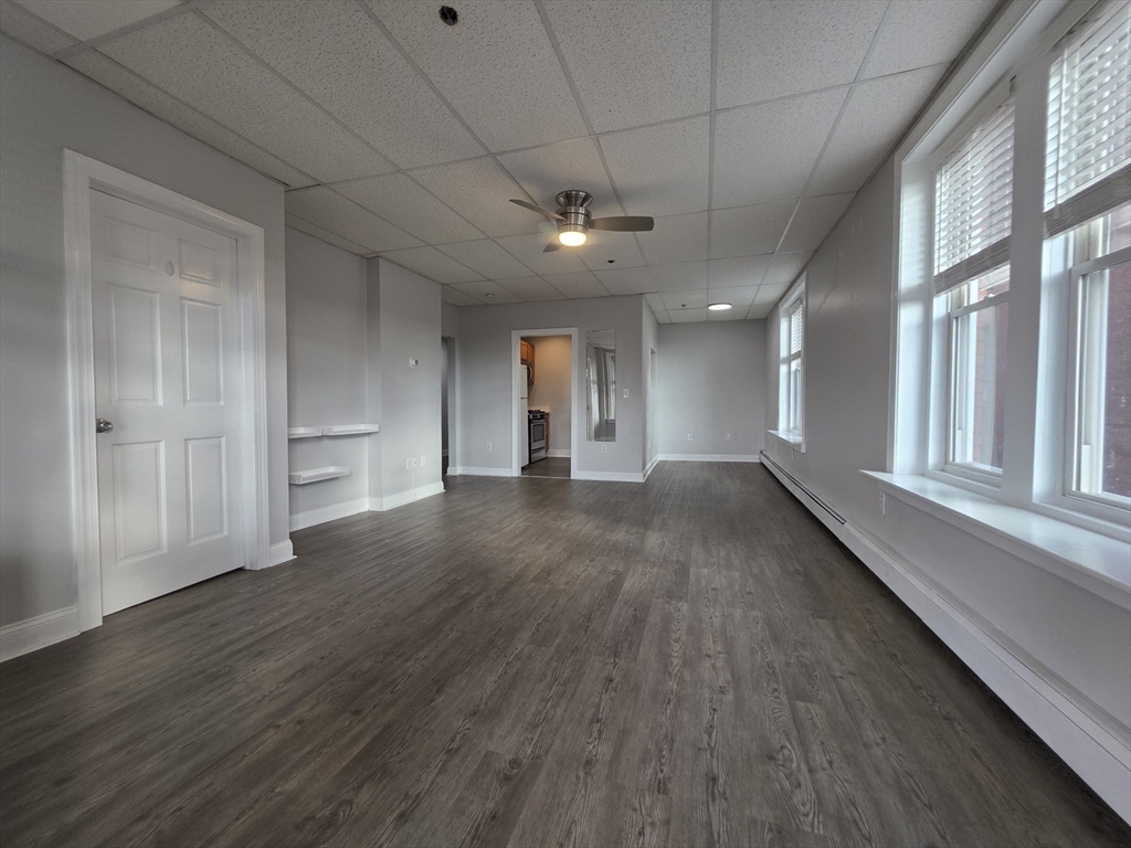 178 High Street, Unit 304 Clinton, MA 01510 - Photo 6 of 24 a view of gallery with wooden floor