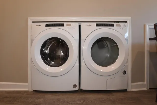 a utility room with dryer and washer