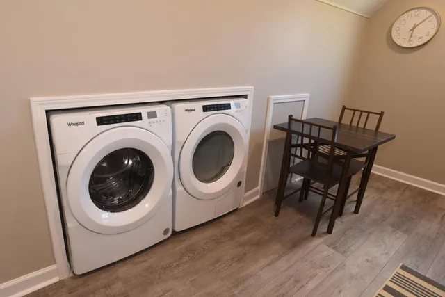 a utility room with dryer and washer
