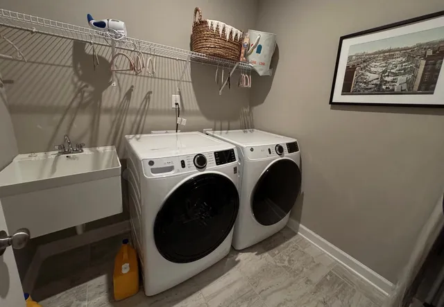 a utility room with dryer and washer