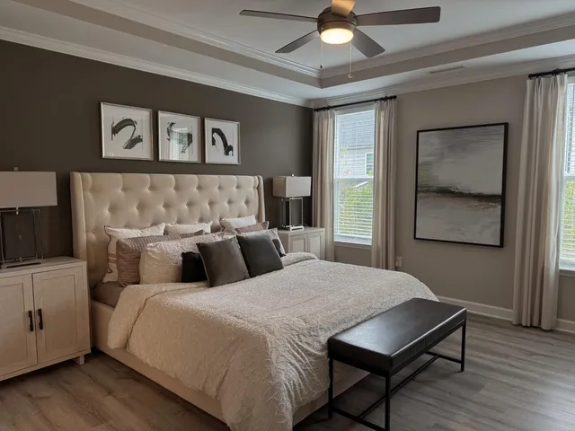 a bedroom with double bed and a window