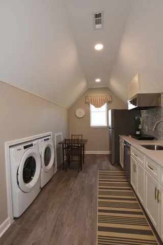 a kitchen with a stove and a microwave