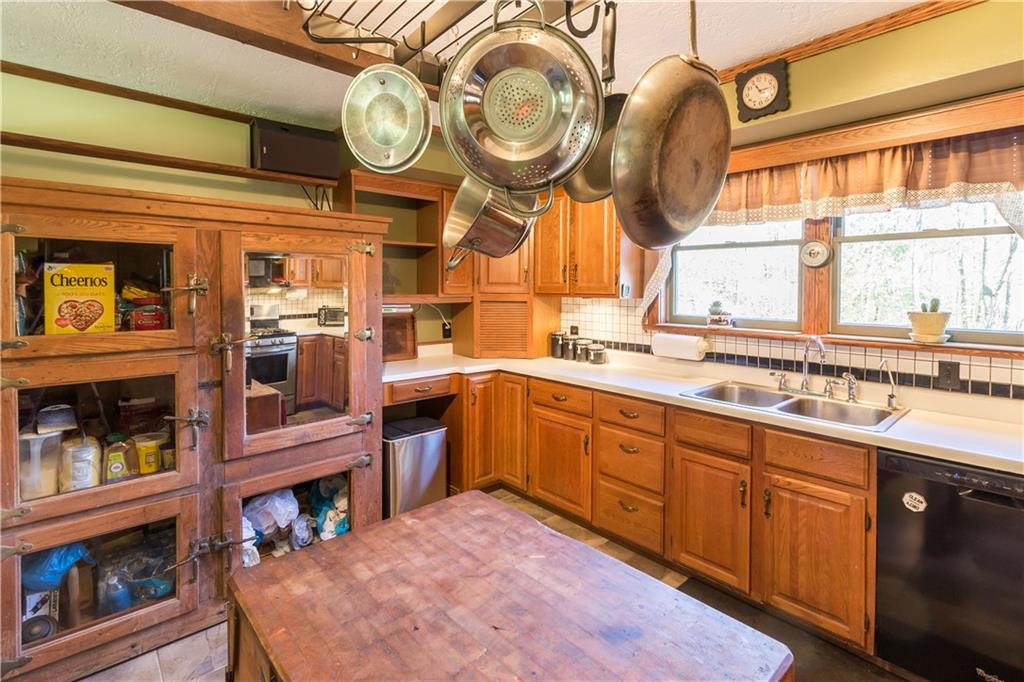 339 Cottage Road Clinton, PA 15026 - Photo 4 of 25 Antique icebox converted to kitchen storage cabinet
