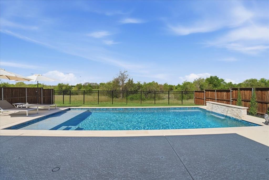 2721 Rotherham Street Prosper, TX 75078 - Photo 30 of 37 a view of a backyard