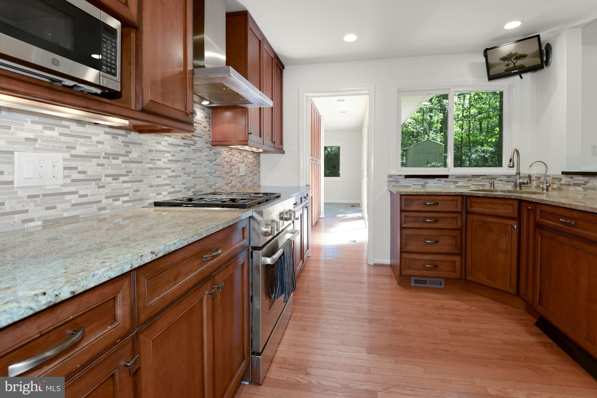 11025 Howland Drive Reston, VA 20191 - Photo 6 of 19 Beautifully updated kitchen with huge pantry area