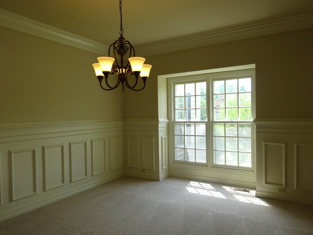 3606 Chesapeake Road St. Charles, IL 60175 - Photo 3 of 25 a view of a room with a large window and chandelier