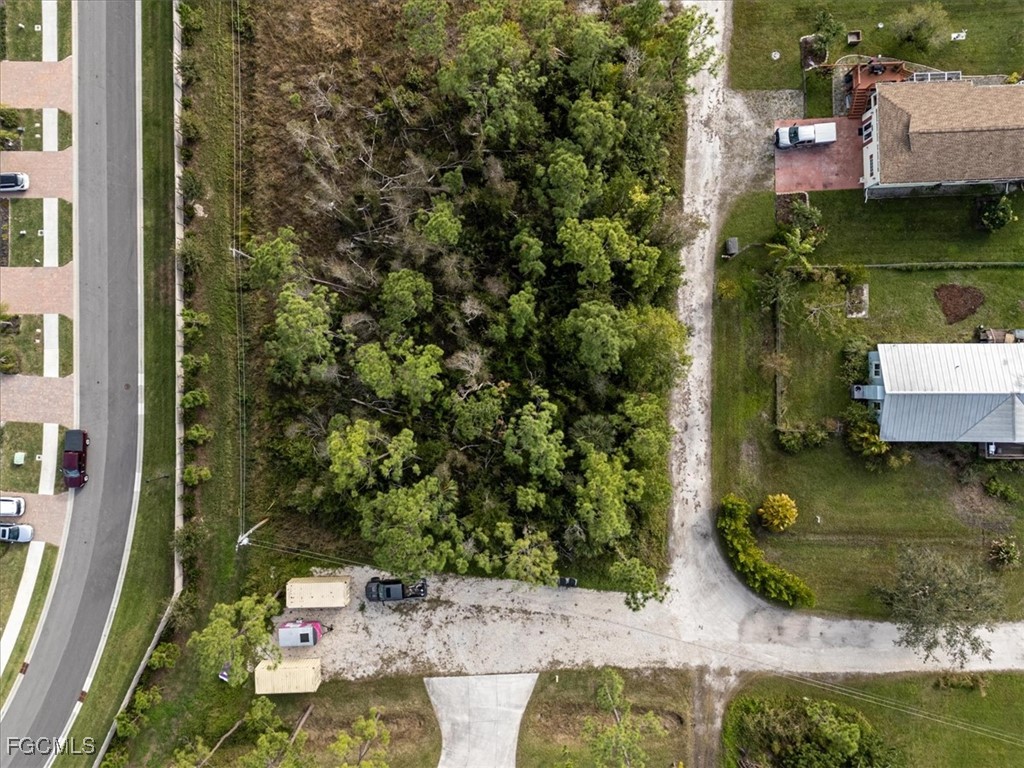 20374 Idlewood Road North Fort Myers, FL 33917 - Photo 12 of 15 an aerial view of a house with a yard