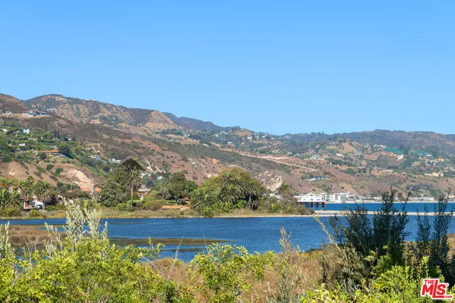 a view of a lake with a mountain