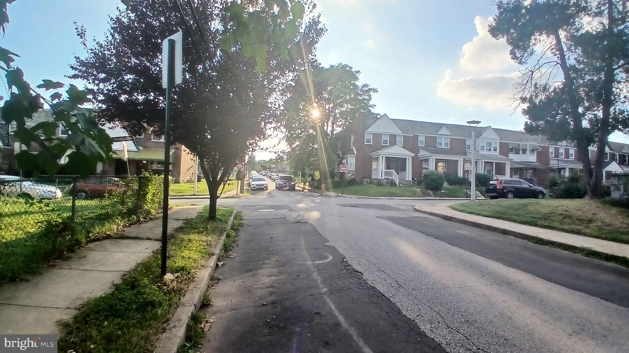 733 Lyndhurst Street Baltimore, MD 21229 - Photo 7 of 8 a view of a street with a houses