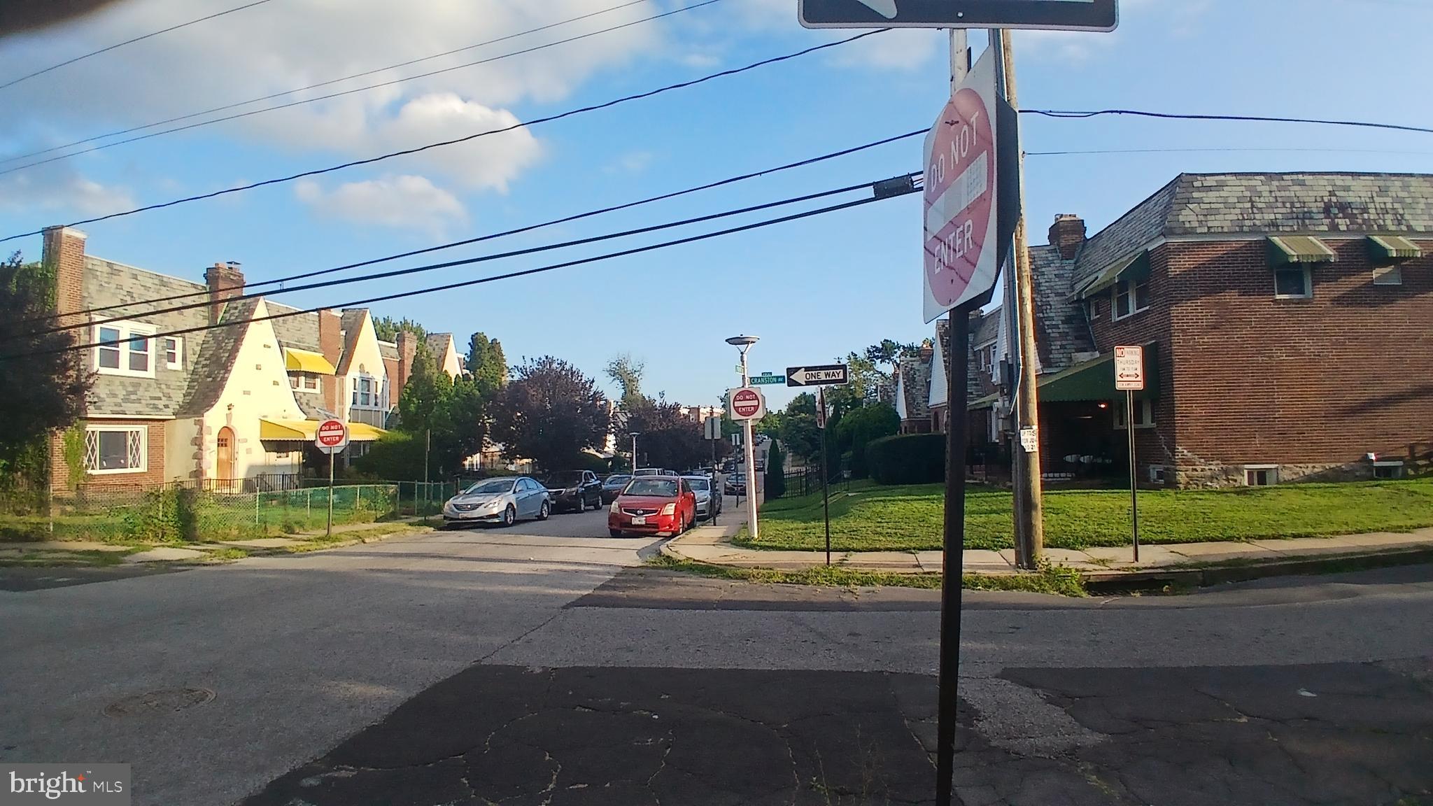 733 Lyndhurst Street Baltimore, MD 21229 - Photo 8 of 8 a view of a park with a car parked on the road