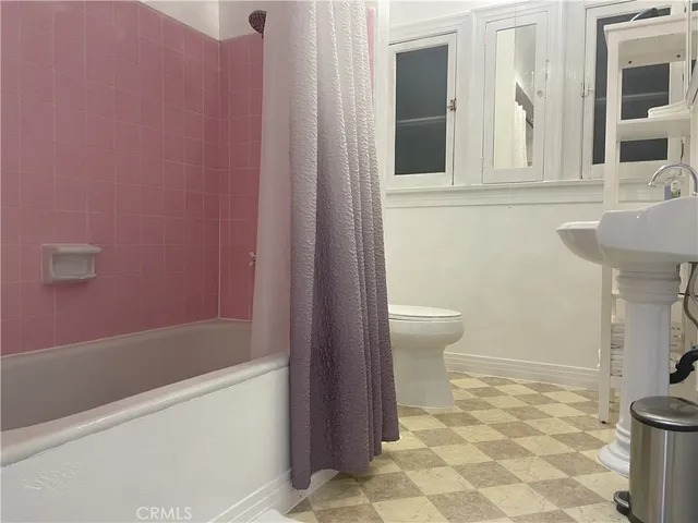 a bathroom with a sink and a toilet