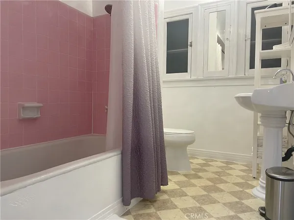 a bathroom with a sink and a toilet