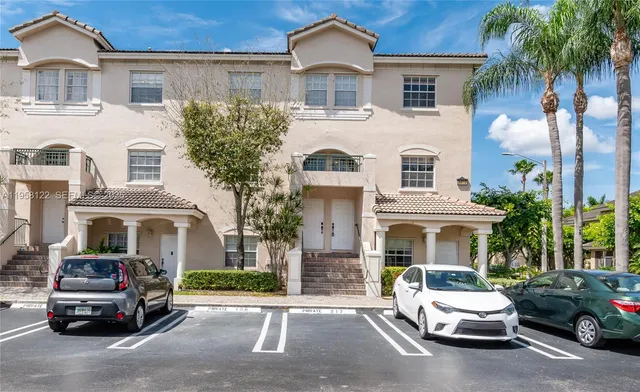 a car parked in front of a house