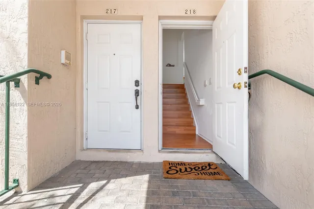 a view of an entryway with staircase