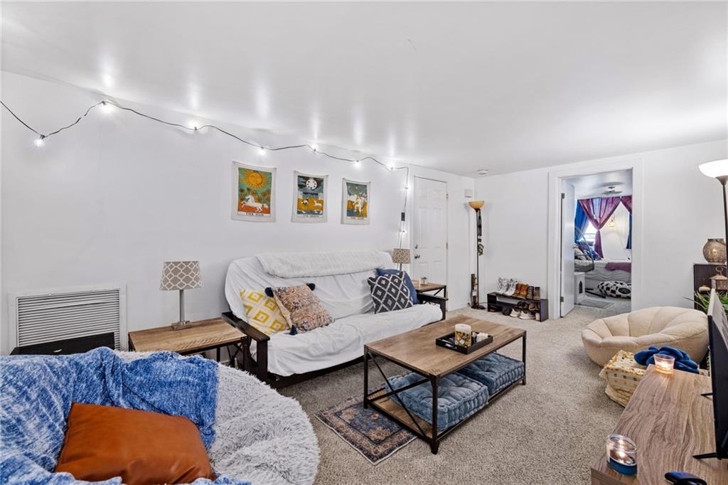 80 South 12th Street Pittsburgh, PA 15203 - Photo 13 of 43 a living room with furniture and a couch