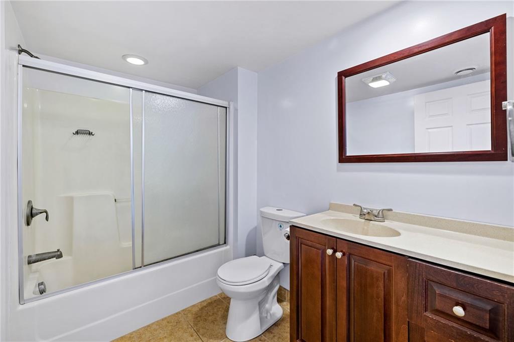 80 South 12th Street Pittsburgh, PA 15203 - Photo 25 of 43 a bathroom with a sink a toilet and shower