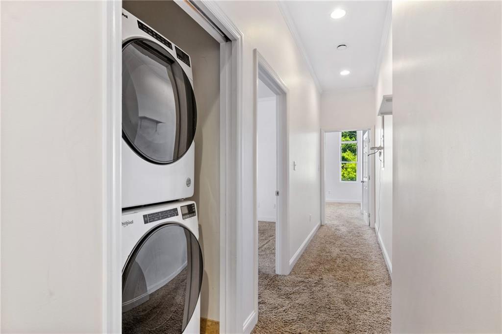 80 South 12th Street Pittsburgh, PA 15203 - Photo 26 of 43 a view of a hallway with washer and dryer