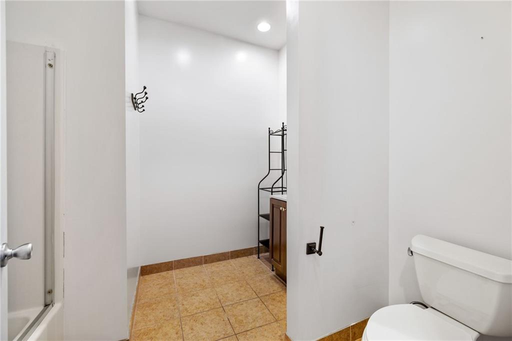 80 South 12th Street Pittsburgh, PA 15203 - Photo 30 of 43 a bathroom with a toilet and a shower