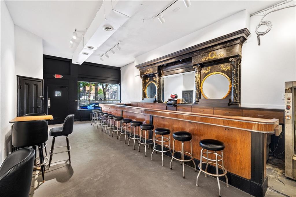 80 South 12th Street Pittsburgh, PA 15203 - Photo 4 of 43 a view of a dining room with furniture and chandelier