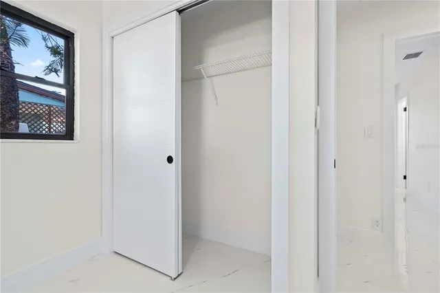 a view of elevator with hallway