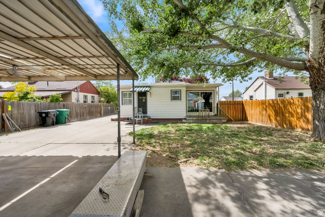 4635 Box Elder Street Murray, UT 84107 - Photo 18 of 21 Fenced backyard with a patio area