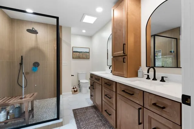 a living room with furniture wooden floor and a fireplace