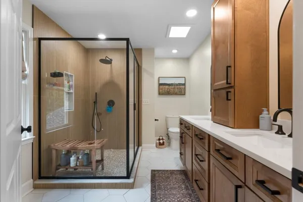 a kitchen with furniture and a fireplace