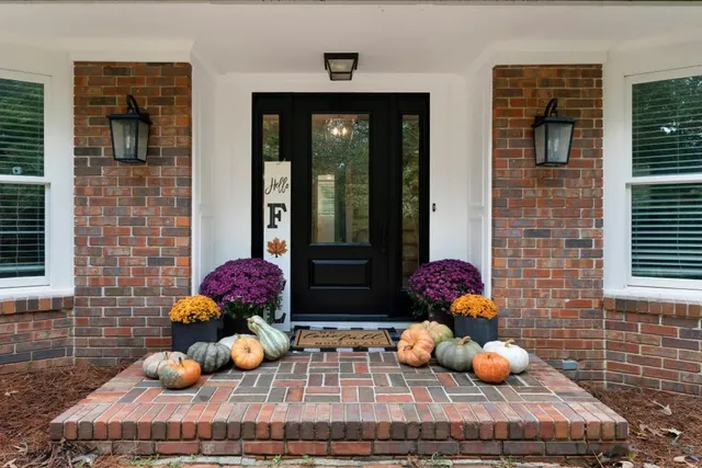 a view of a chairs and table in a patio