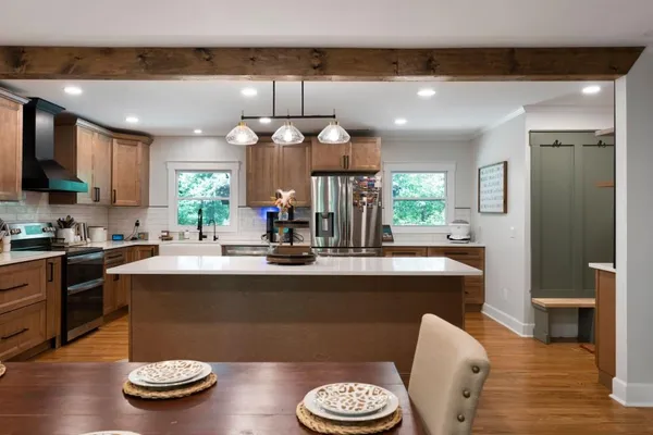 a backyard of a house with lots of green space