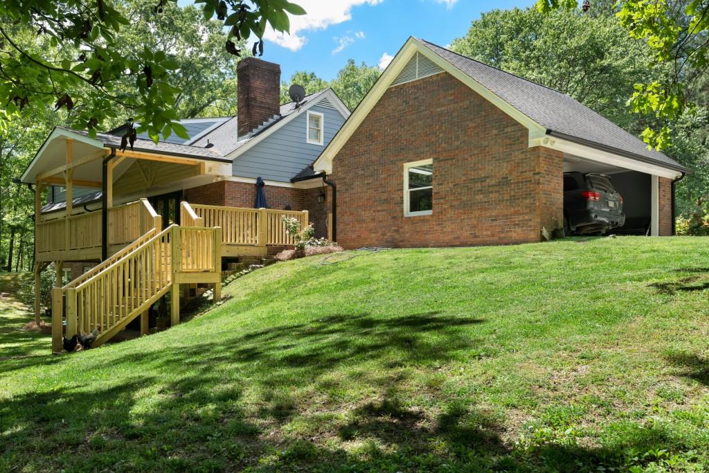 311 Herring Road Armuchee, GA 30105 - Photo 58 of 66 a view of a house with a yard