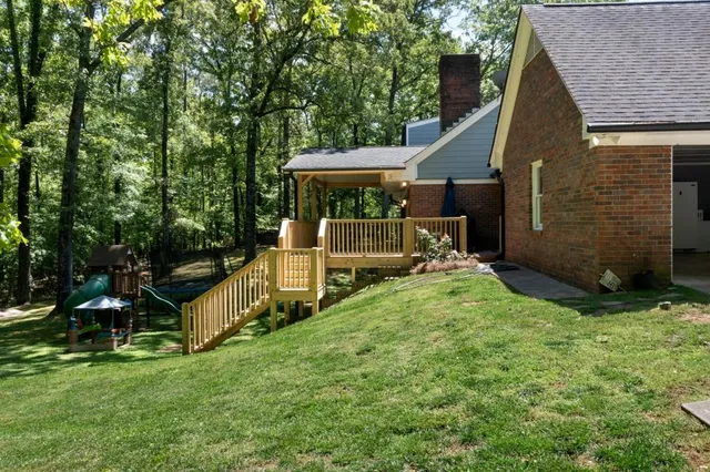 a room with stainless steel appliances and cabinets