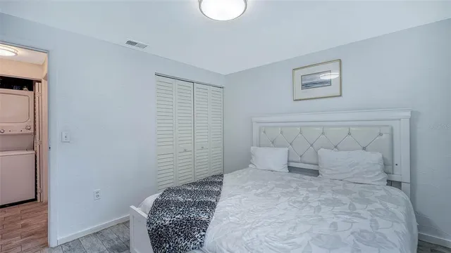 a roof deck with table and chairs