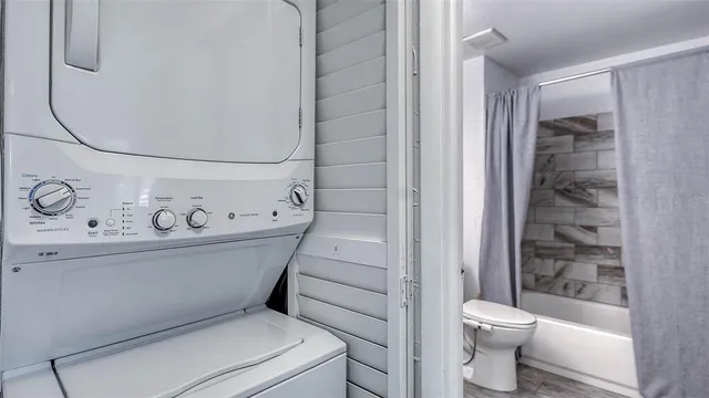 a view of a terrace with seating space and barbeque oven