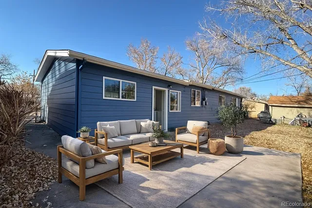a view of a backyard of the house