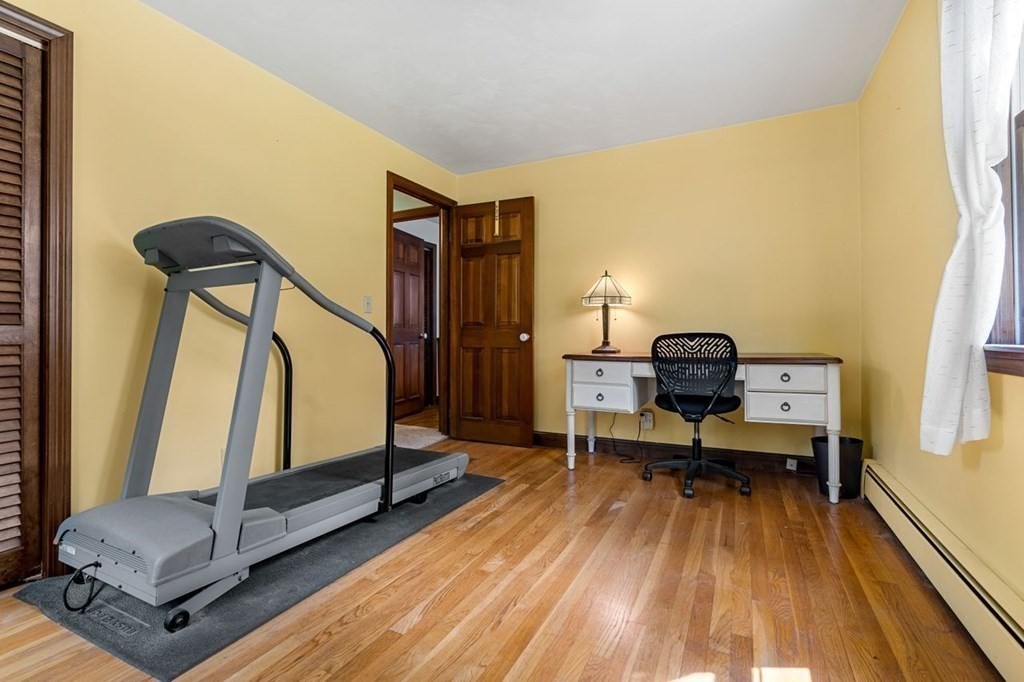 25 Pine Ridge Drive Ayer, MA 01432 - Photo 16 of 30 a view of a workspace with furniture and a window