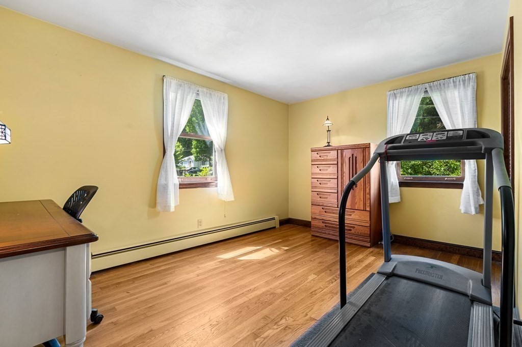 25 Pine Ridge Drive Ayer, MA 01432 - Photo 17 of 30 a view of a livingroom with furniture and a window