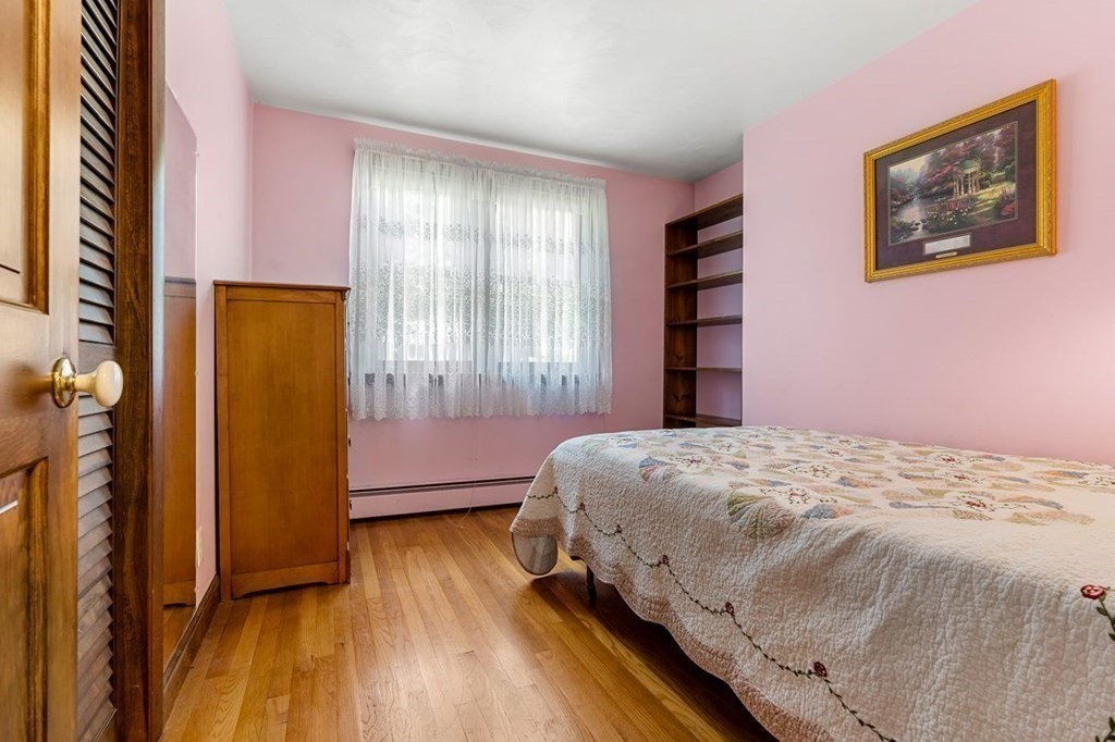 25 Pine Ridge Drive Ayer, MA 01432 - Photo 18 of 30 a bedroom with a bed and a window