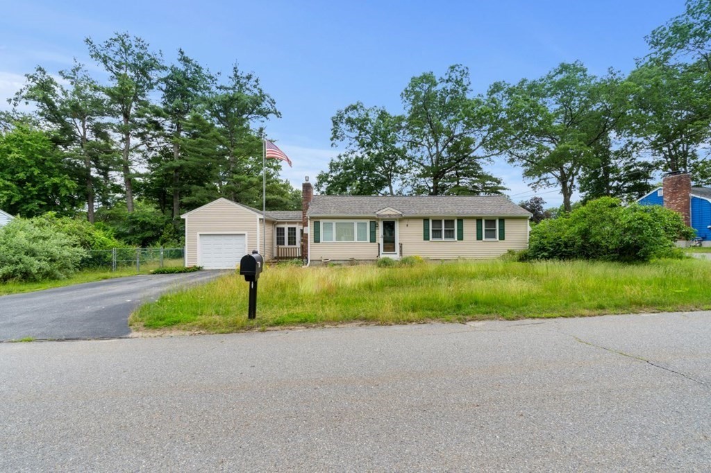 25 Pine Ridge Drive Ayer, MA 01432 - Photo 2 of 30 a front view of house with yard and green space