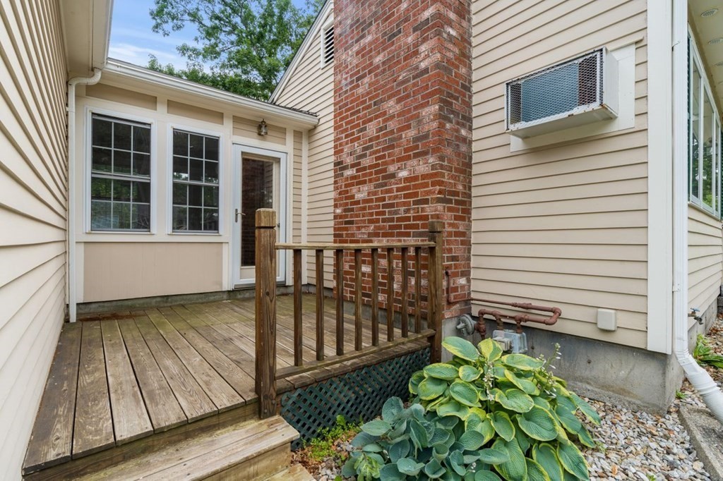 25 Pine Ridge Drive Ayer, MA 01432 - Photo 3 of 30 a view of a porch with wooden floor