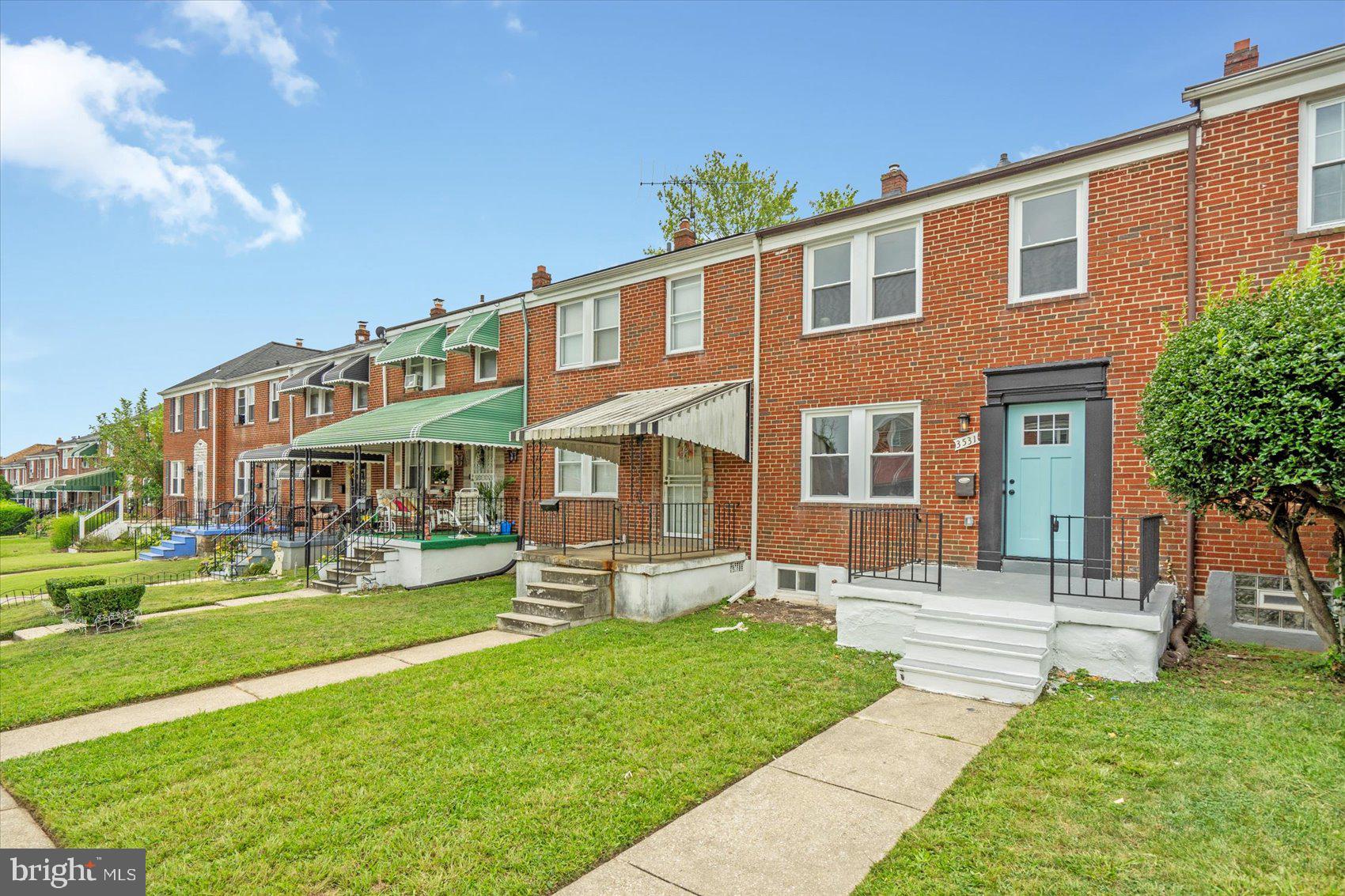 3531 Elmora Avenue Baltimore, MD 21213 - Photo 2 of 38 a front view of house with yard