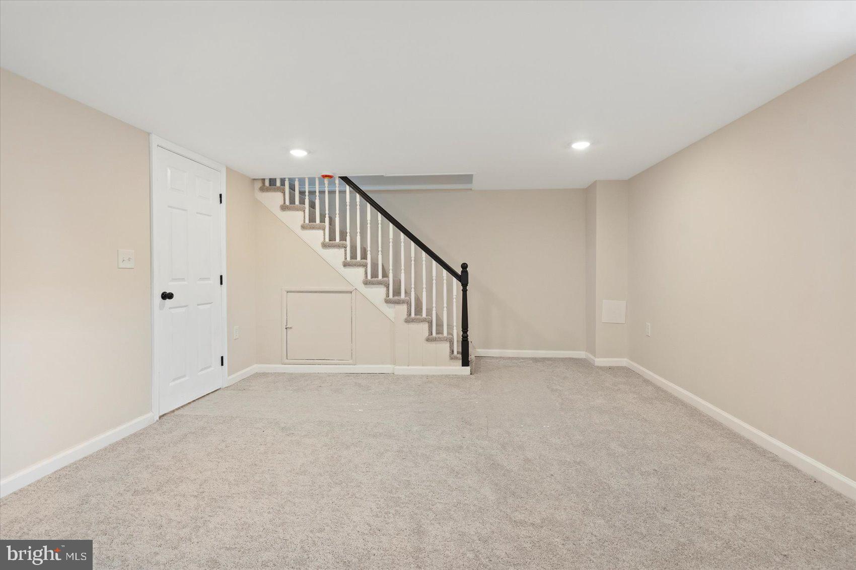 3531 Elmora Avenue Baltimore, MD 21213 - Photo 33 of 38 a view of an empty room with stairs