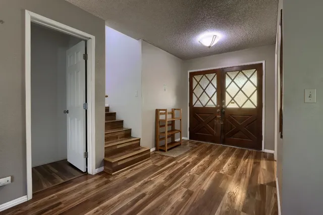 a bathroom with a sink vanity and mirror