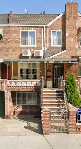 a front view of a house with a porch