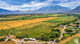 19 East Southfield Road Spanish Fork, UT 84660 - Photo 1 of 74 Overview of rural landscape with a mountainous background