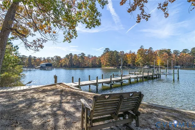 a view of a lake with sitting area