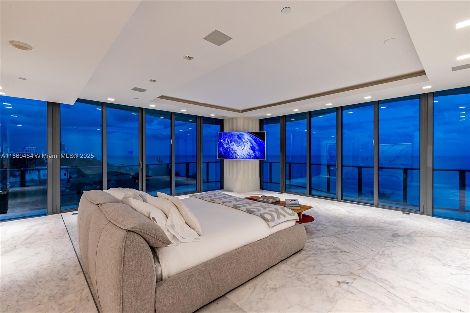 19575 Collins Avenue, Unit 6 Sunny Isles Beach, FL 33160 - Photo 40 of 42 a bed room with a bed and a closet