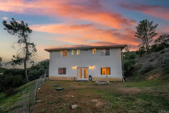 a view of a water pond with lots of trees
