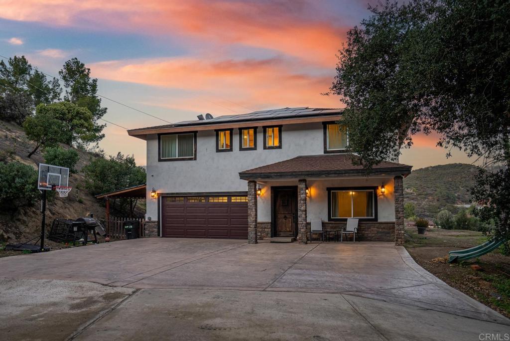 20591 Sycamore Springs Road Jamul, CA 91935 - Photo 41 of 53 a front view of a house with a yard
